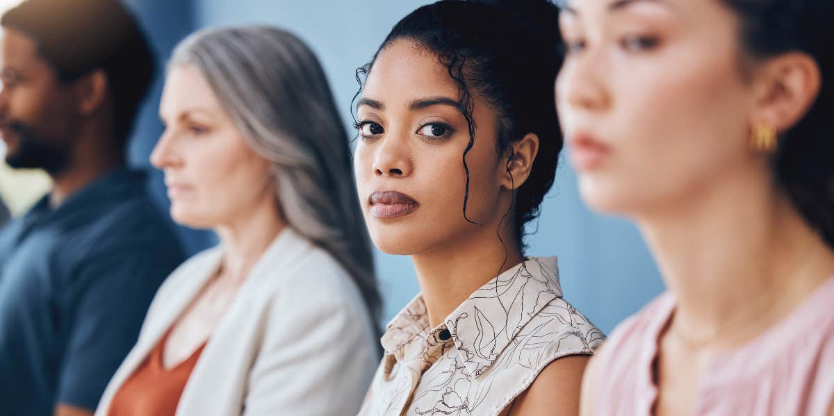 woman next to other people