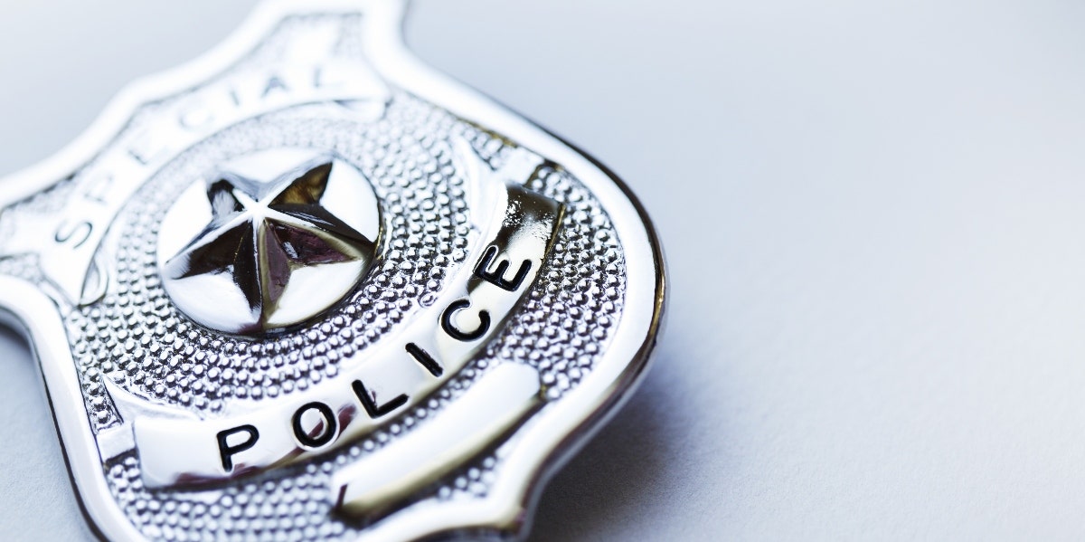 Oregon Woman Was Tricked Into Believing She Was A DEA Agent For Over A Year police badge