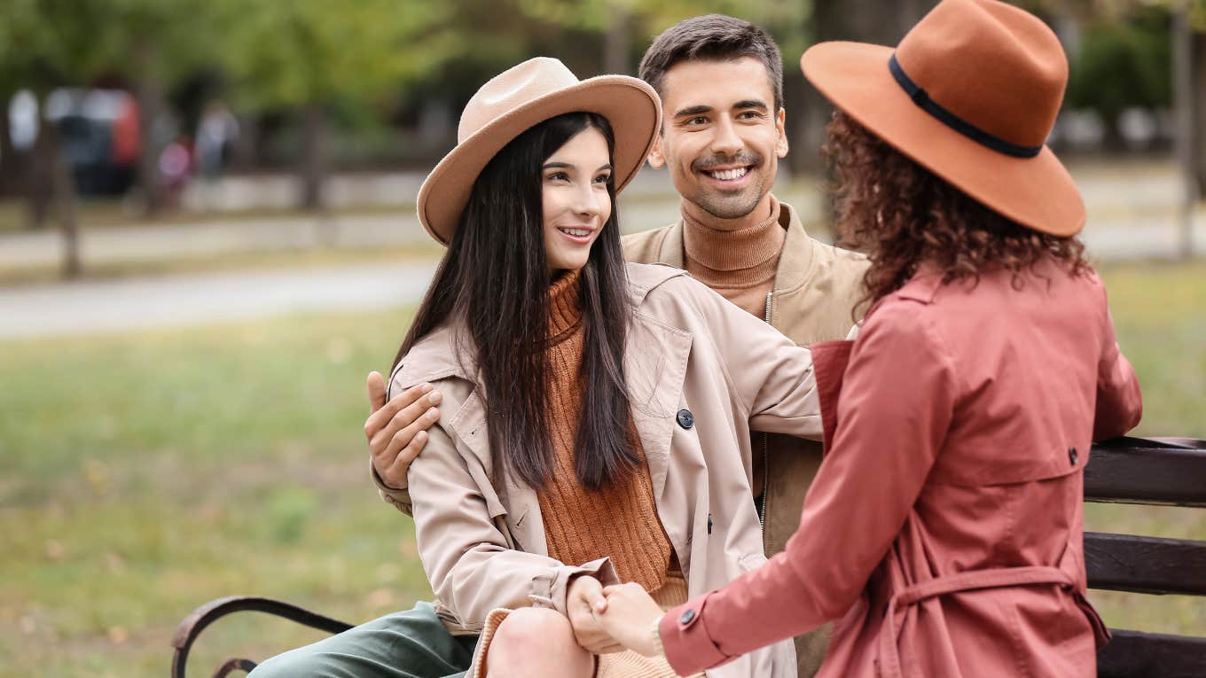 Woman with husband and girlfriend 