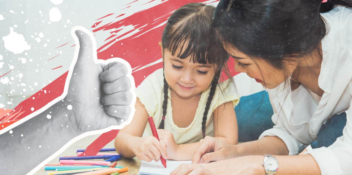 Mom helping her daughter draw