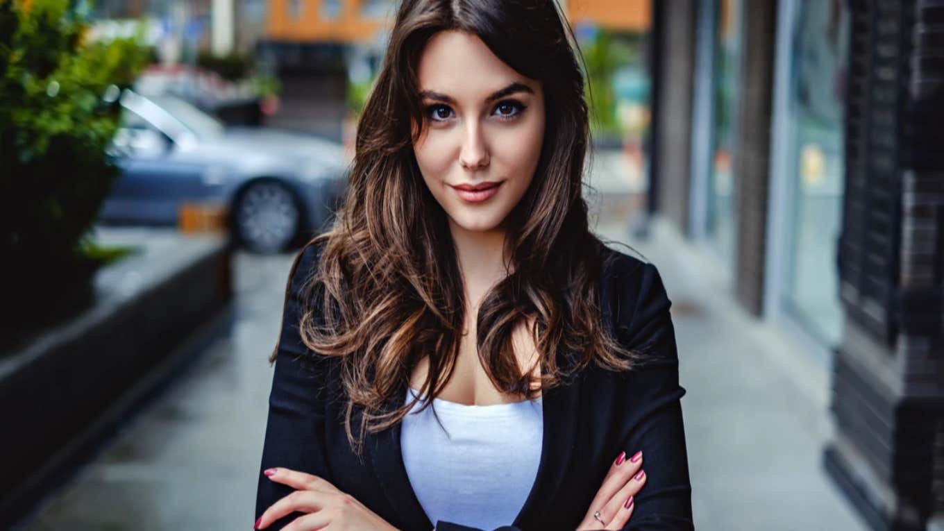 5 Powerful Habits Assertive People Use To Make People Respect Them assertive woman with her arms crossed