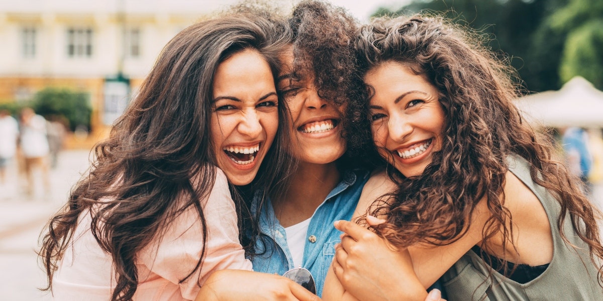 three women hugging