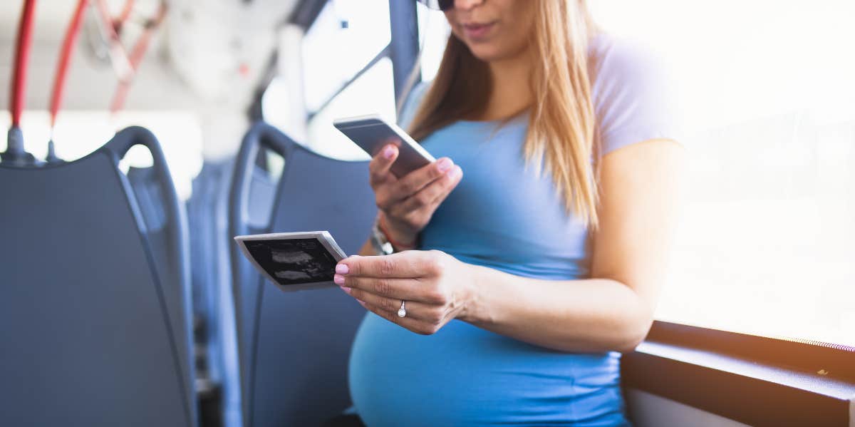 Pregnant woman on a bus