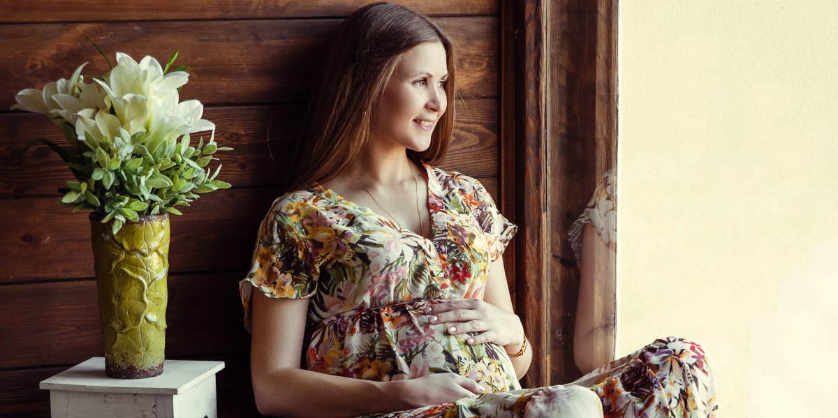 Pregnant woman in her home