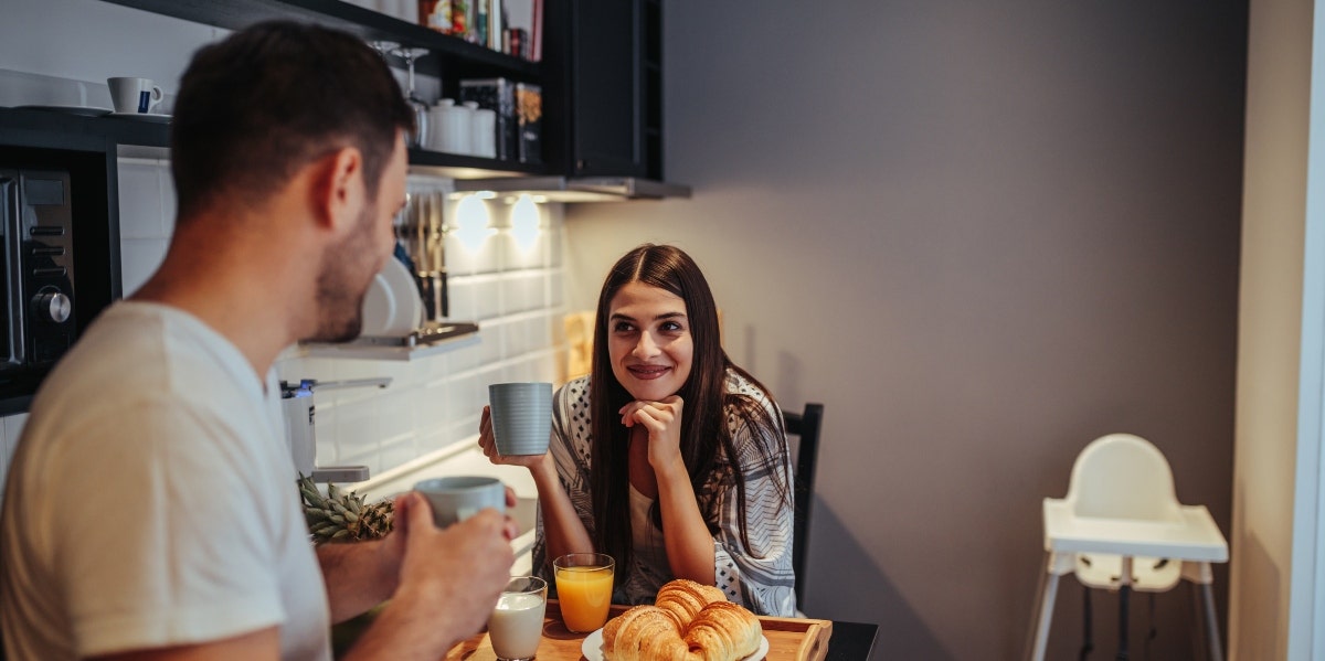 couple talking at the breakfast table