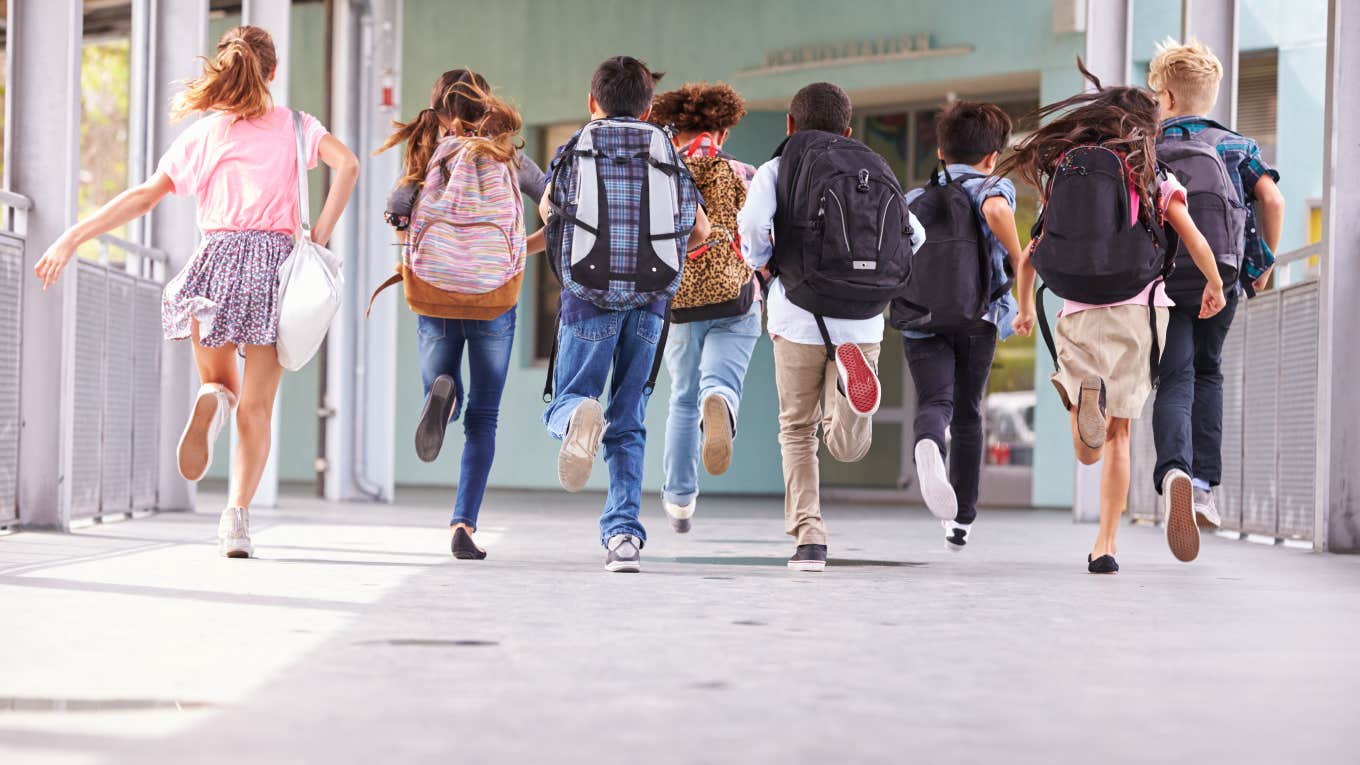 kids running into school