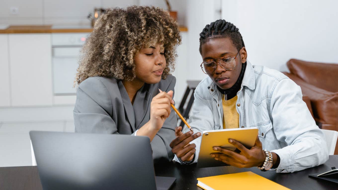 The Problem With Bosses Who Get Rid Of Employees With Performance Problems co-workers in a meeting