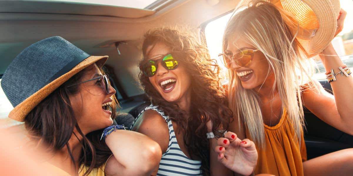 friends hanging out in car