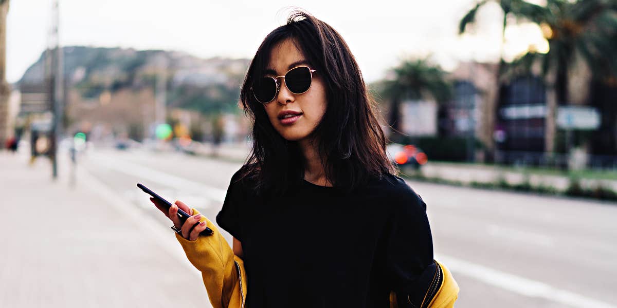 The psychological advice that won't make you happy Asian woman on a city street