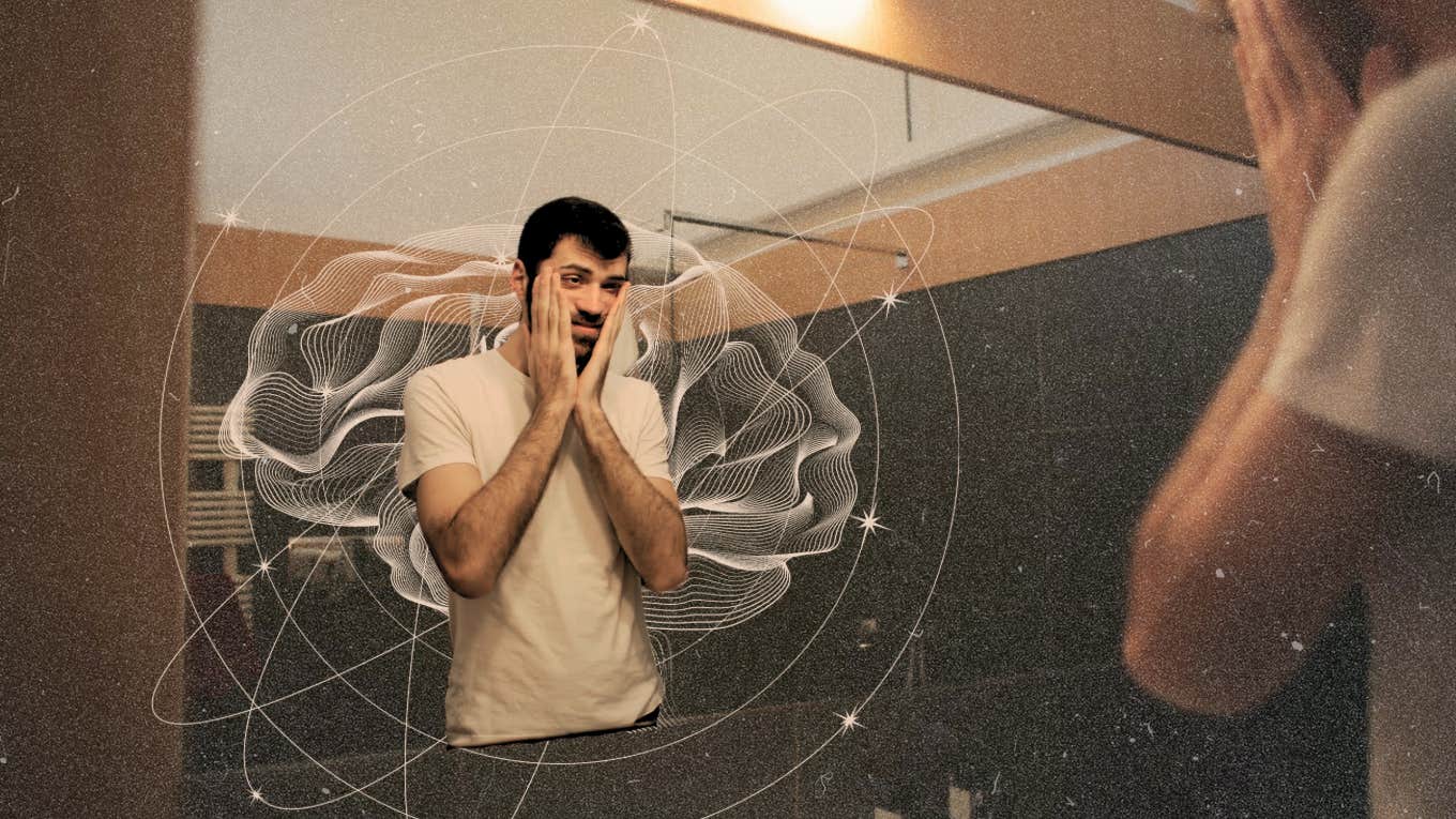 Psychological Habits Making You Unhappy Unhappy man standing in mirror