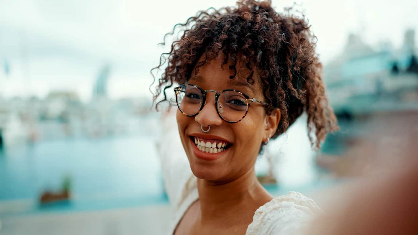 woman with nose ring smiling