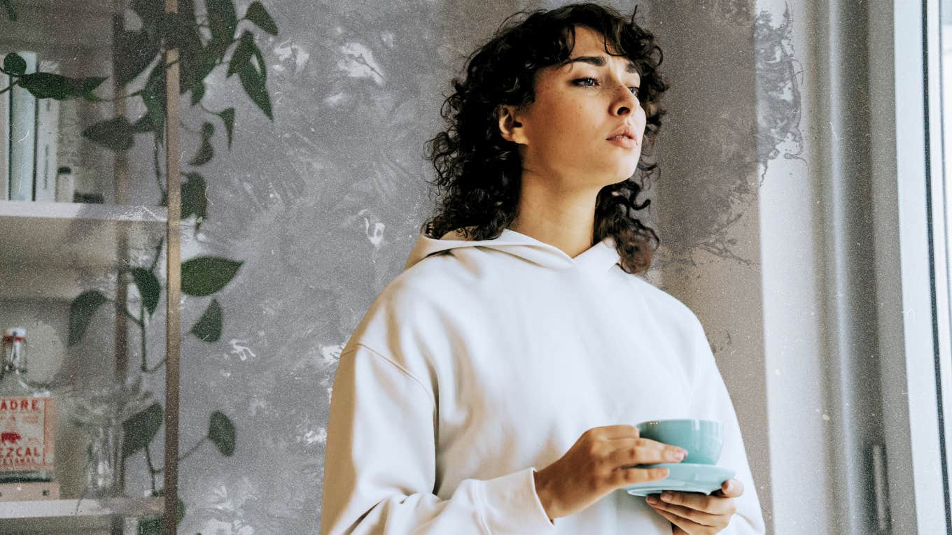 4 Tiny Habits That Make You Feel Inadequate Woman feeling inadequate looking out window