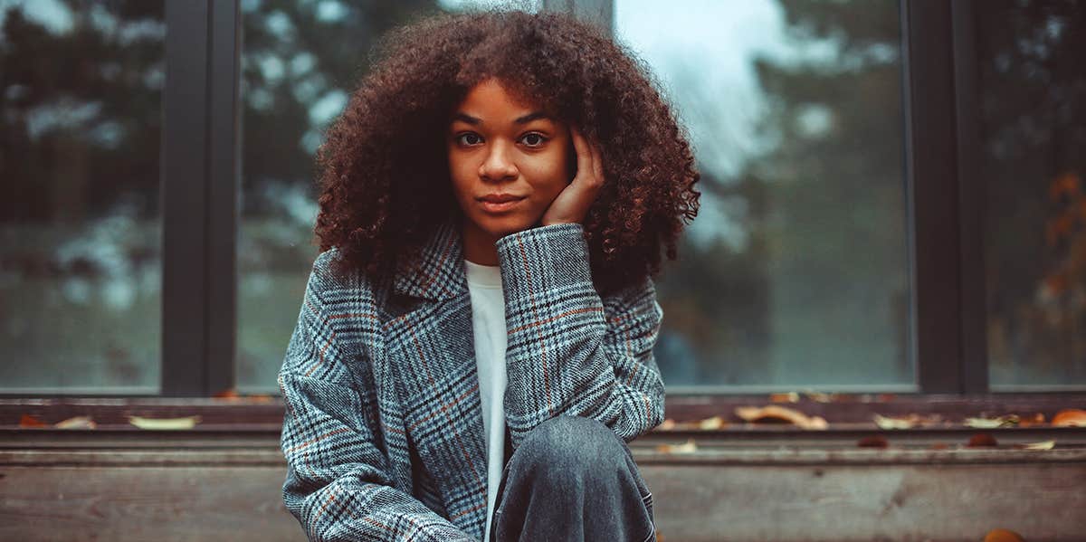 Psychological Skills That'll Let You Become Your Own Therapist girl sitting alone thinking