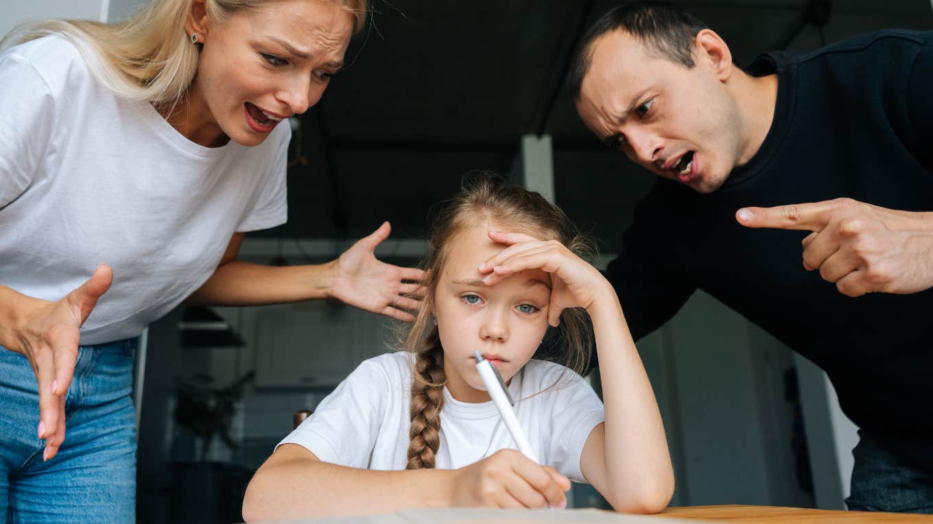 parents yelling at their child