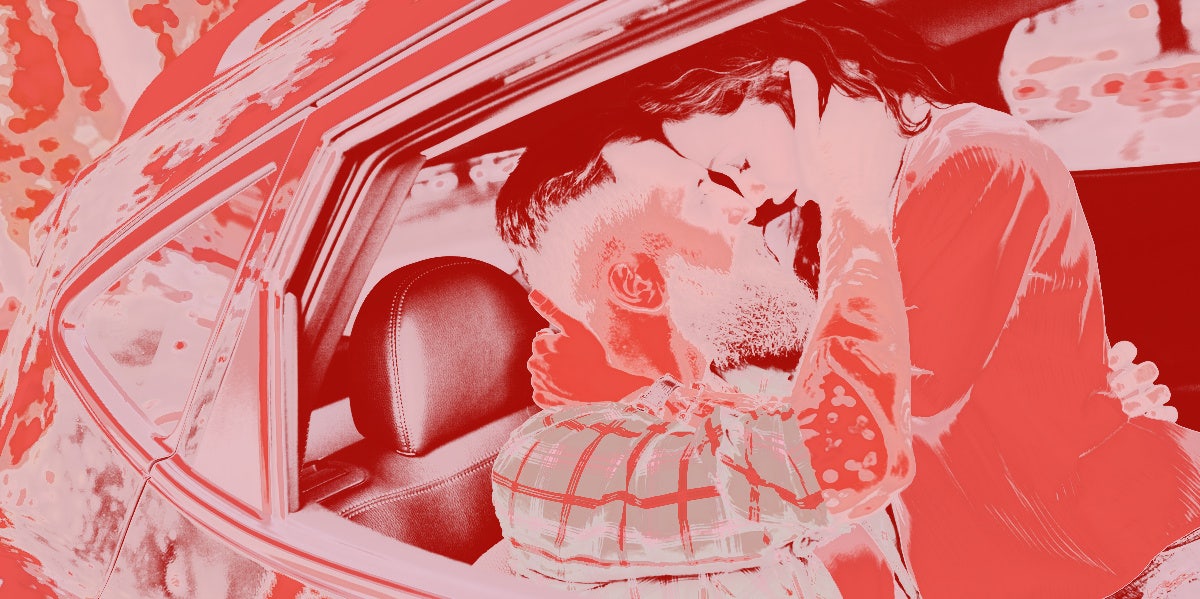 couple kissing in car