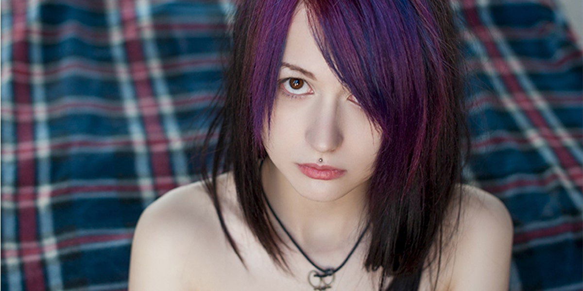 emo woman staring at camera