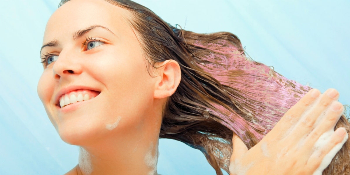 woman using purple shampoo