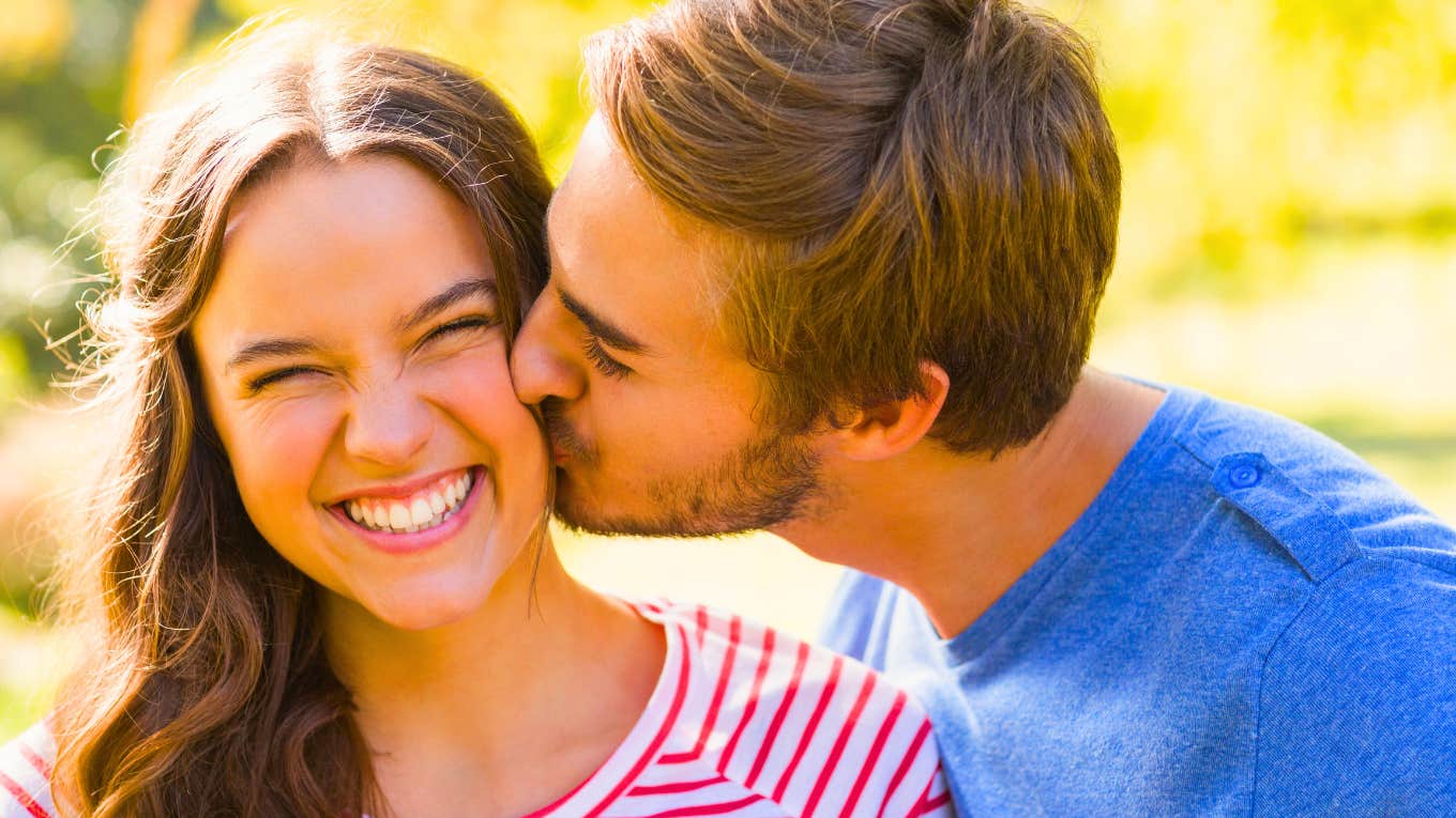 Cute couple in the park on a sunny day