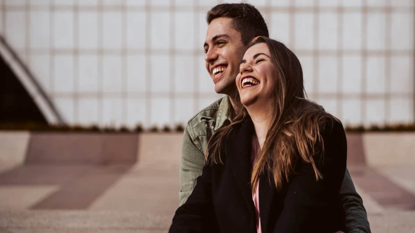 couple laughing together