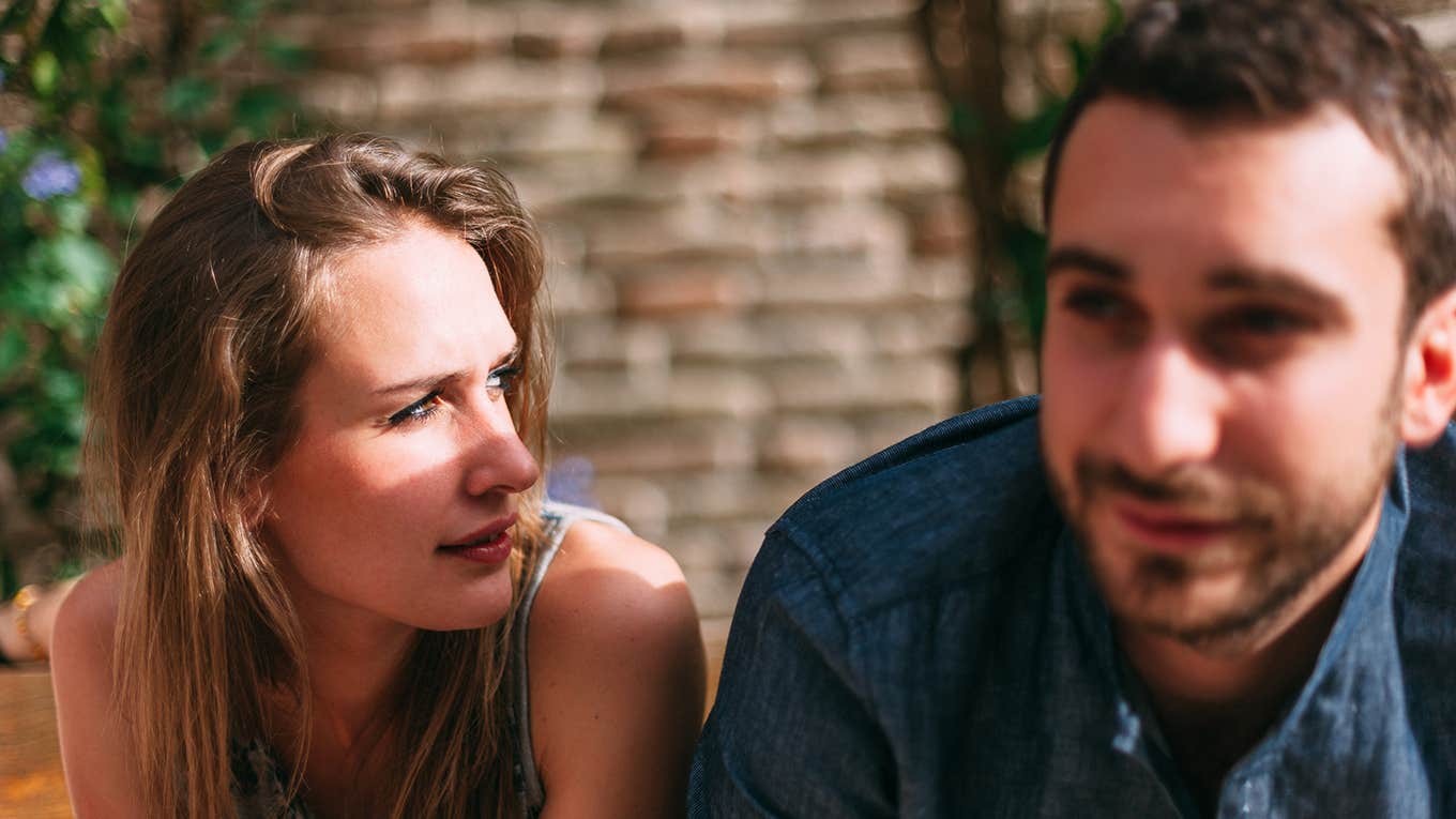 Young Couple talking to each other on a sunny day