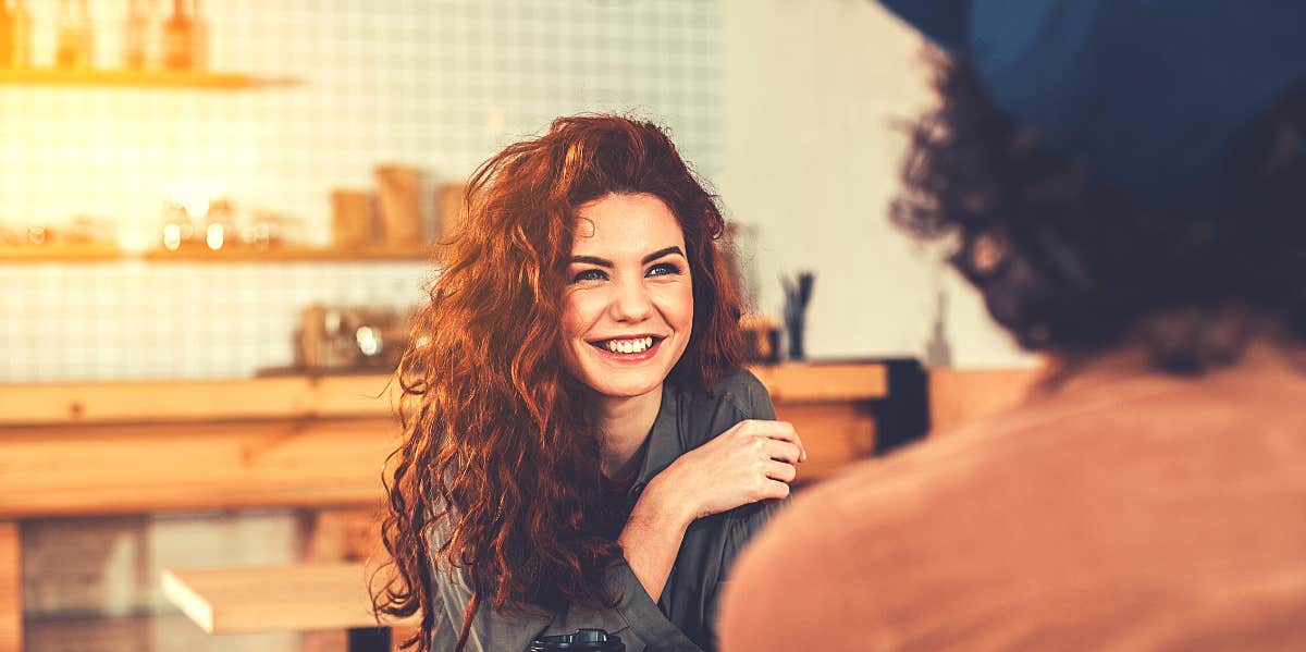 115 Questions To Ask Your Crush To Get To Know Them On A Whole New Level redheaded woman asking her crush questions