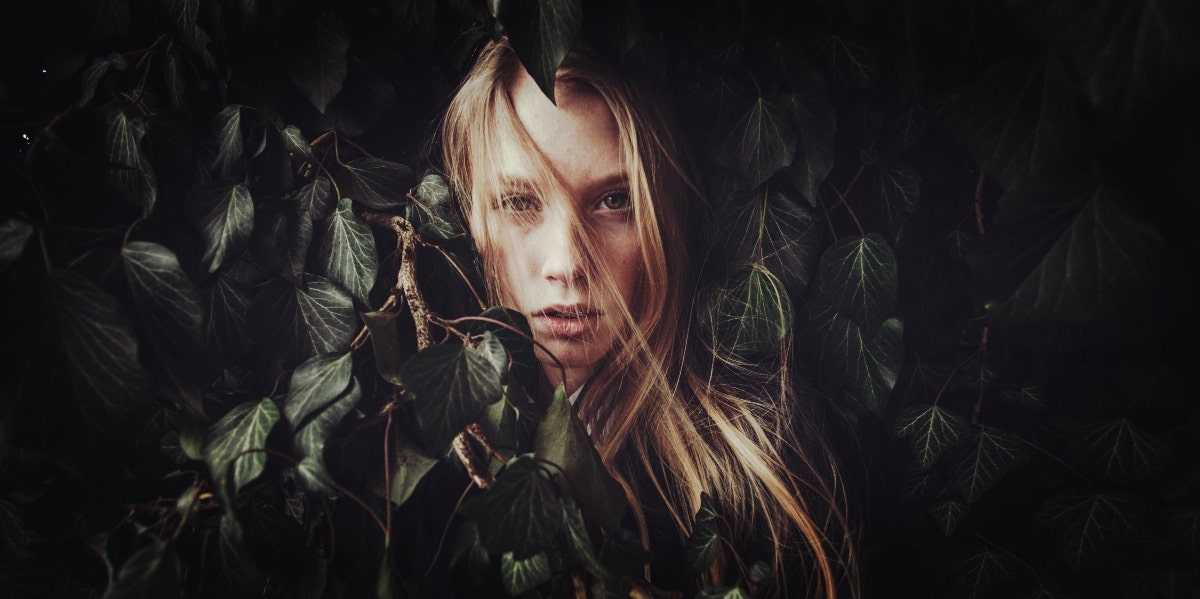 3 Ways To Quiet Your Inner Critic & Find Your True Self woman quieting her inner critic and finding her true self