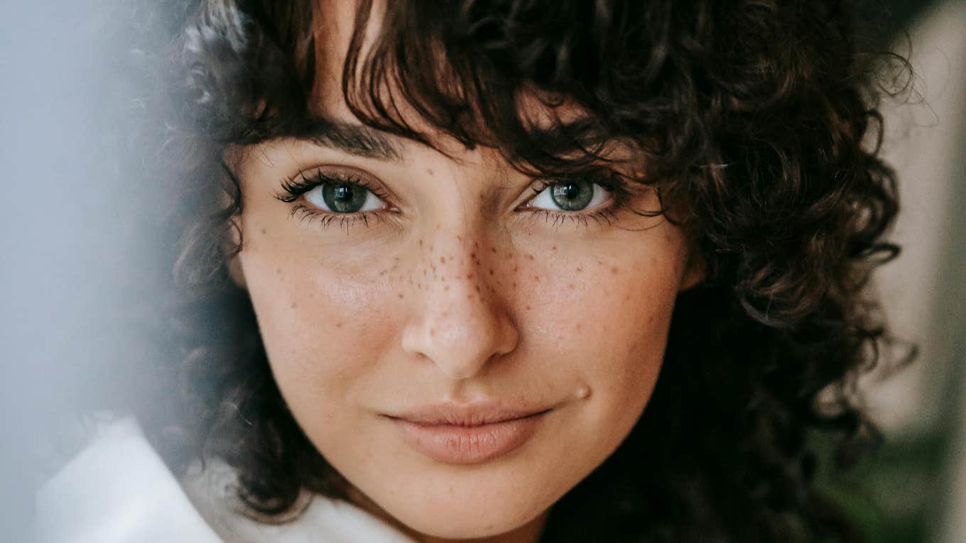 charming attractive woman with freckles