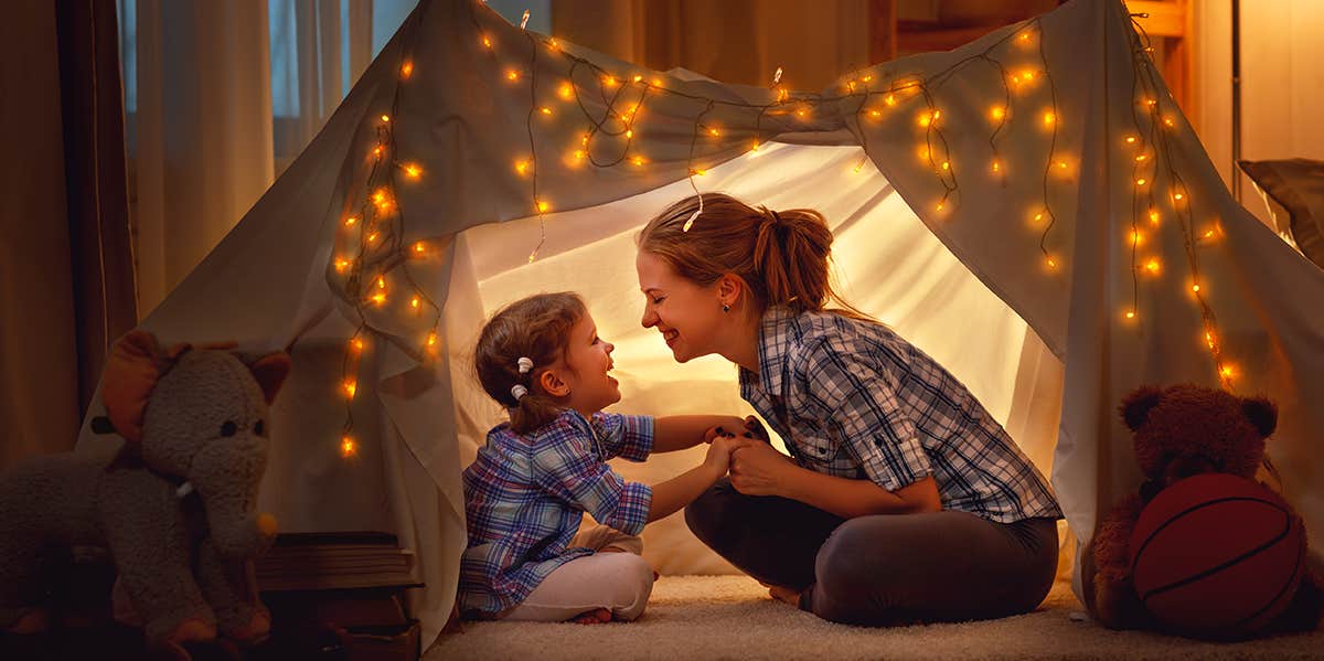 parent and child in a fort