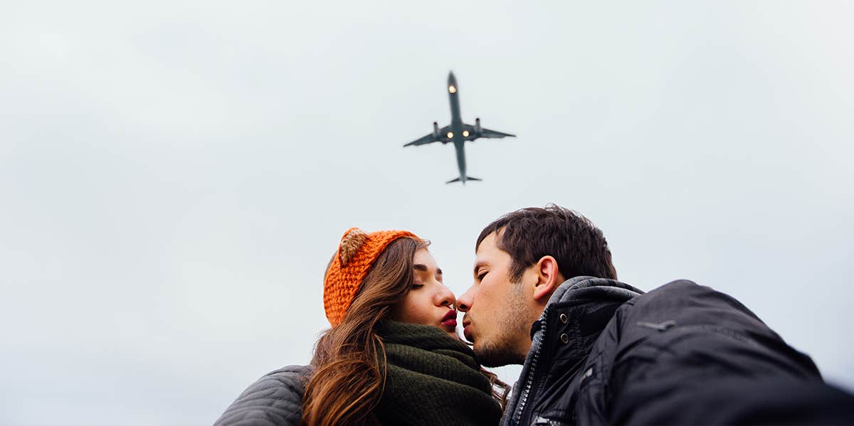 woman and man kissing 