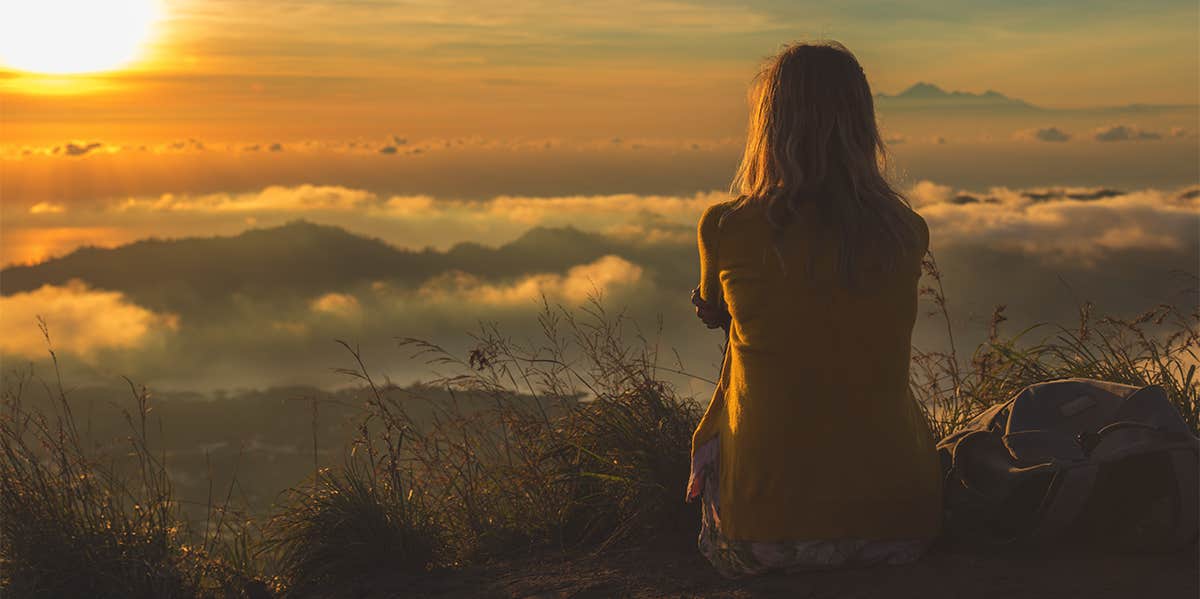 woman sitting in sunset