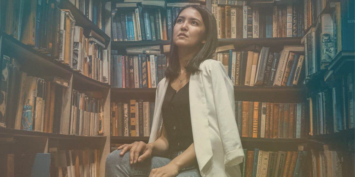 Sexy Habits That Immediately Elevate Your Intelligence intelligent woman sitting in library