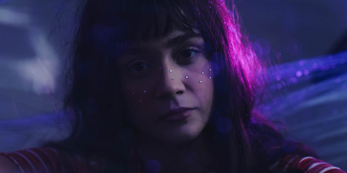 The Real Reason Your Relationship Stinks (Hint: It's You) woman in dark room