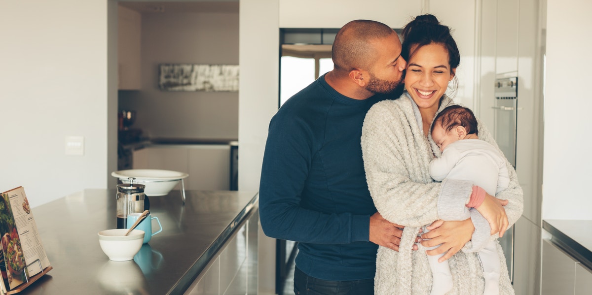 parents being affectionate with baby