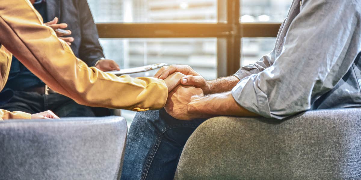 6 Most Common Reasons Marriages End In Divorce — And Whether Counseling Can Help holding hands