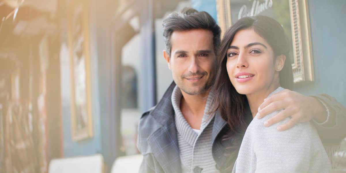 couple sitting on bench