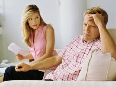 4 Ways To Avoid Fighting About Money Couple exasperated over bills