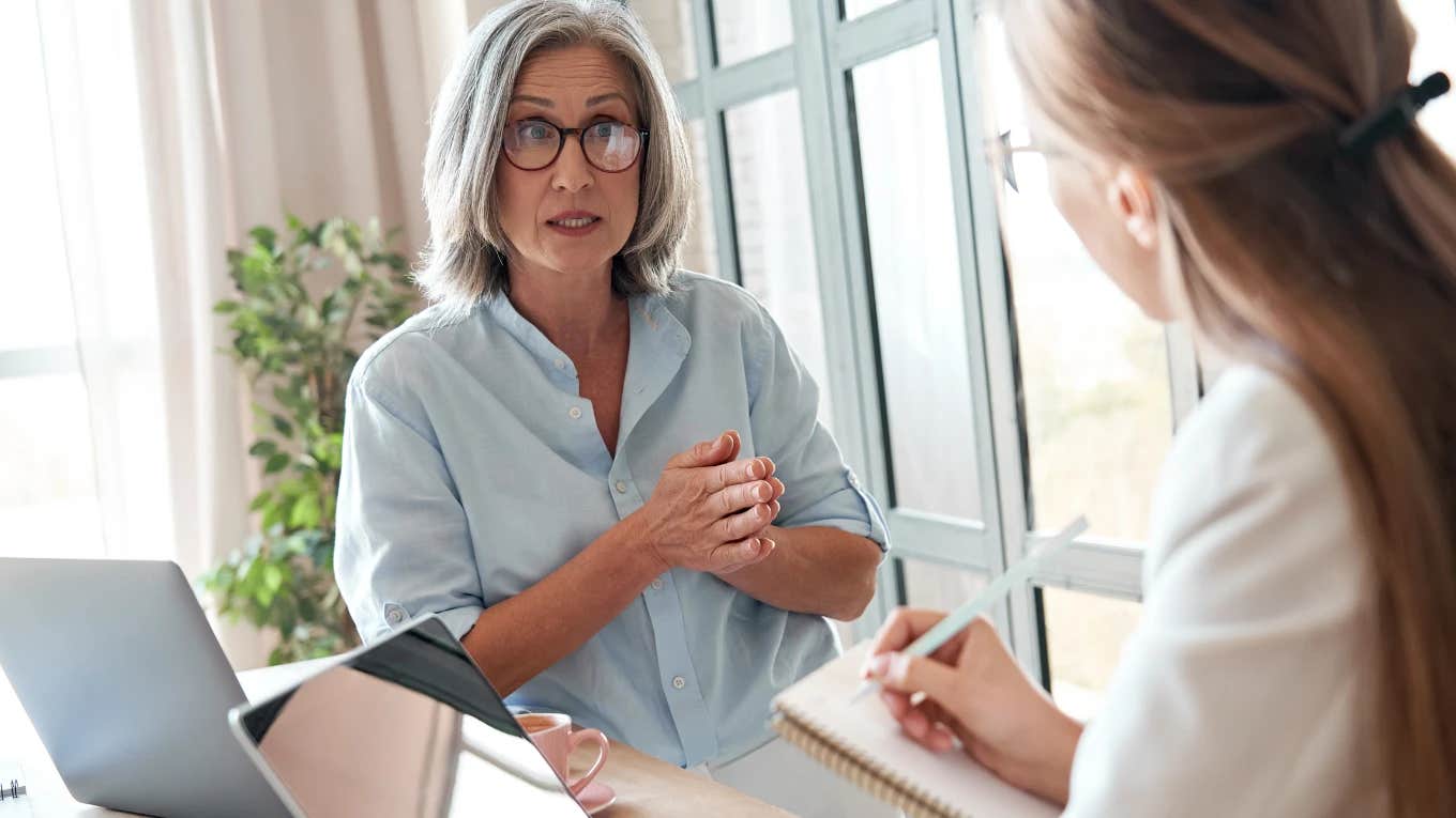 woman talking to boss