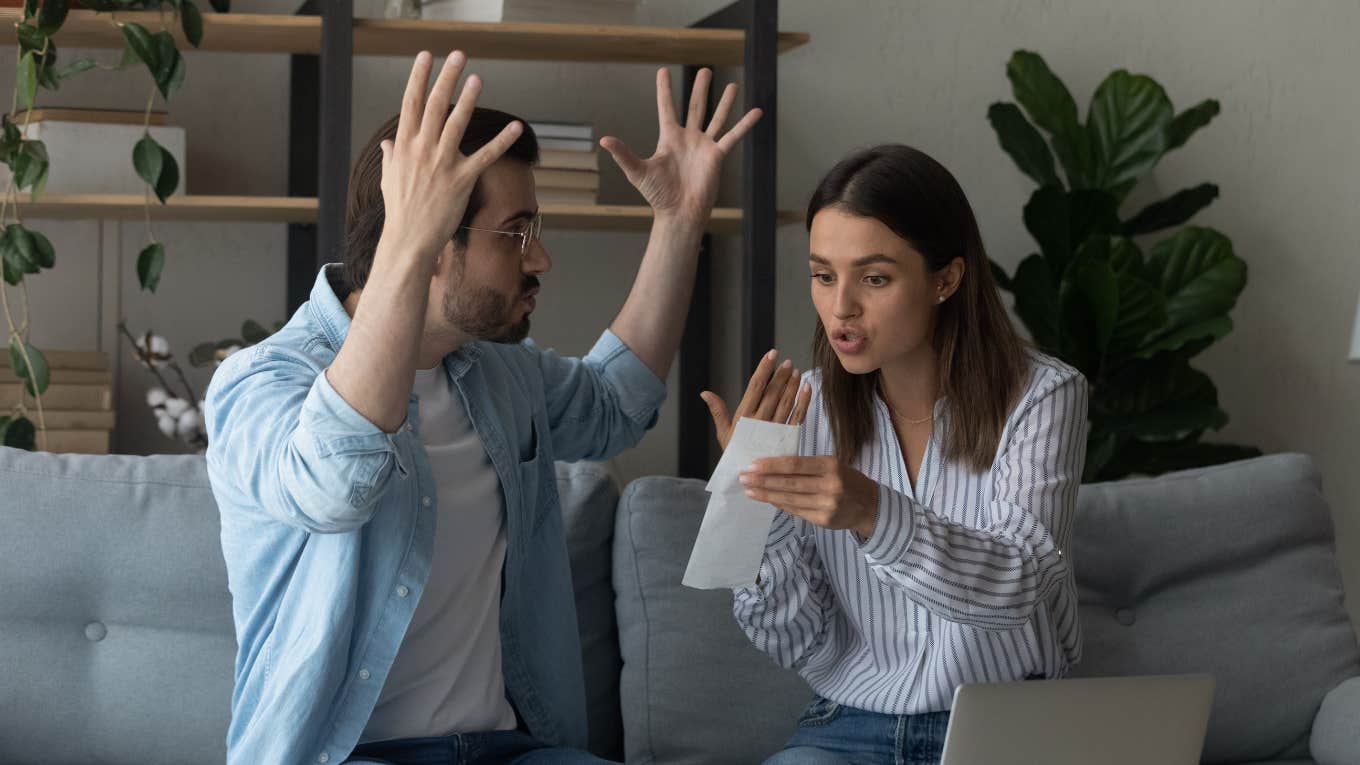 married couple arguing over money because the husband doesn't know how to be poor