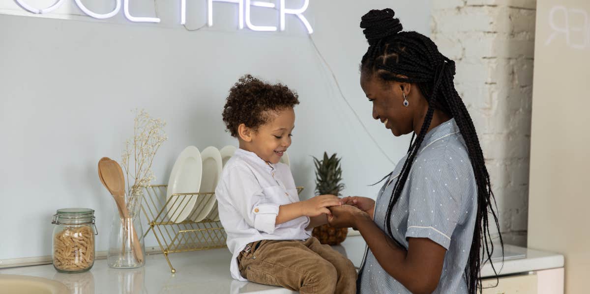 mother and son laughing together