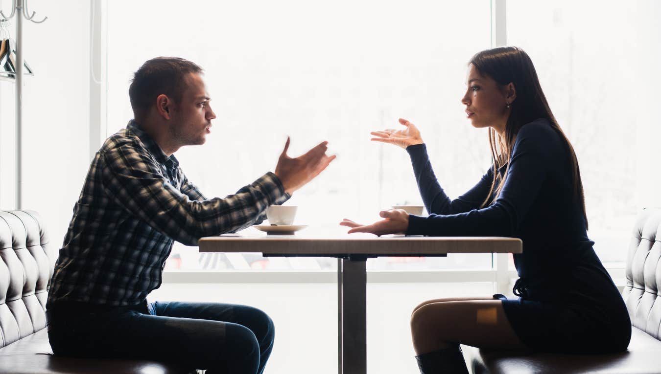 couple arguing in restaurant