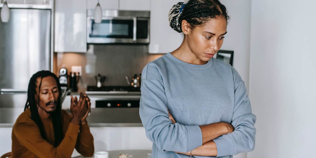 Woman with her back turned to her husband