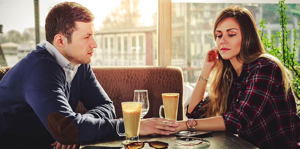 serious couple at restaurant