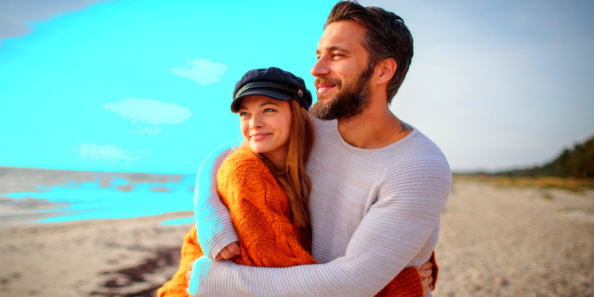 The 5 Stages Of A Relationship & How To Get Through Each smiling couple hugging