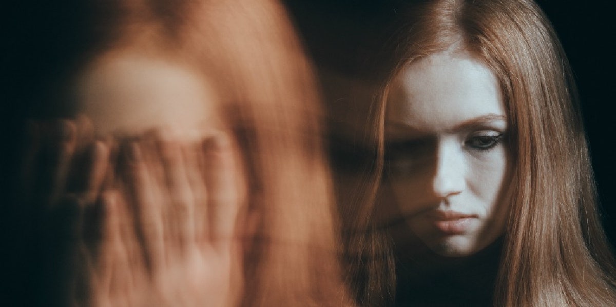 Counting Calories: My Unhealthy Relationship With Food sad woman head in hands