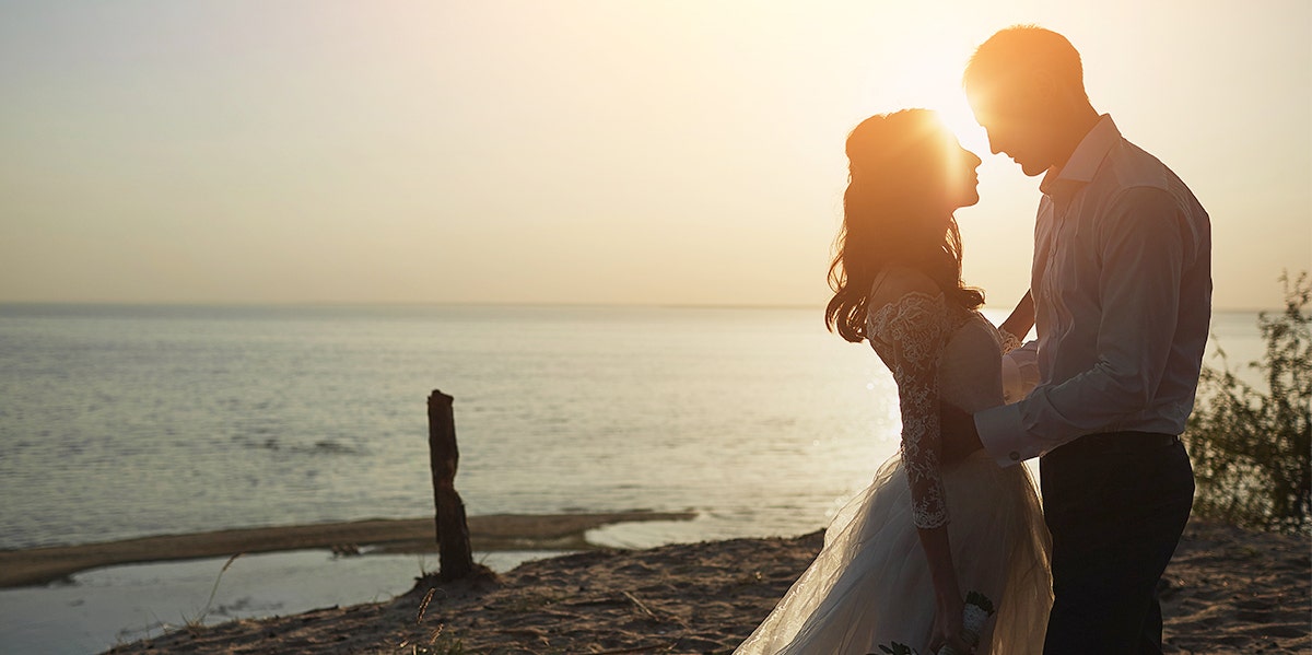 What Remarrying My Ex-Husband Taught Me About Anger And Forgiveness husband and wife in sunset