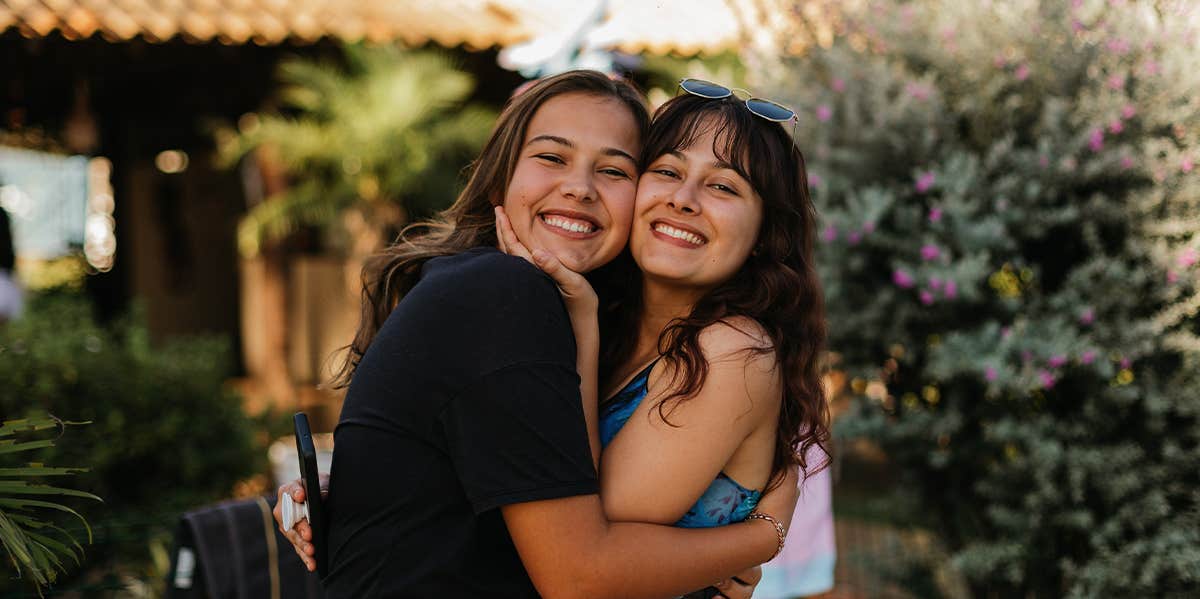 sisters hugging