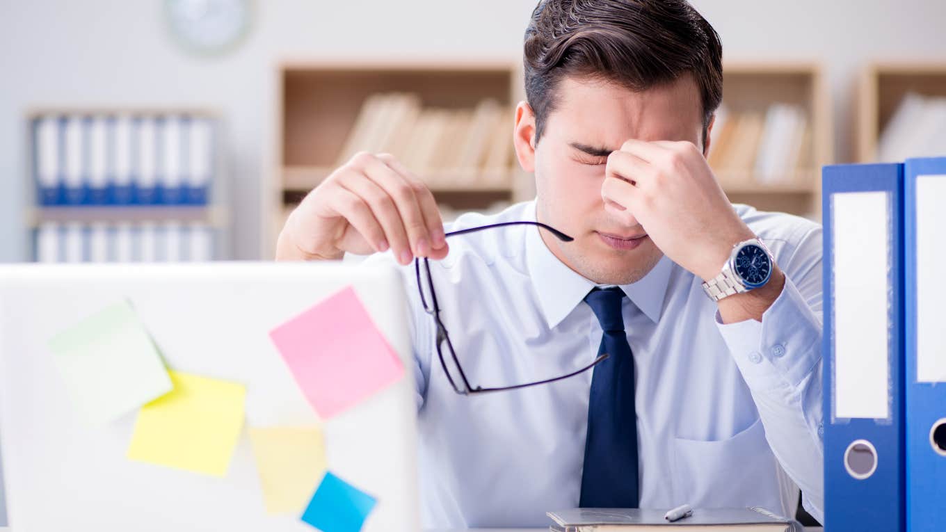 frustrated employee sitting at desk