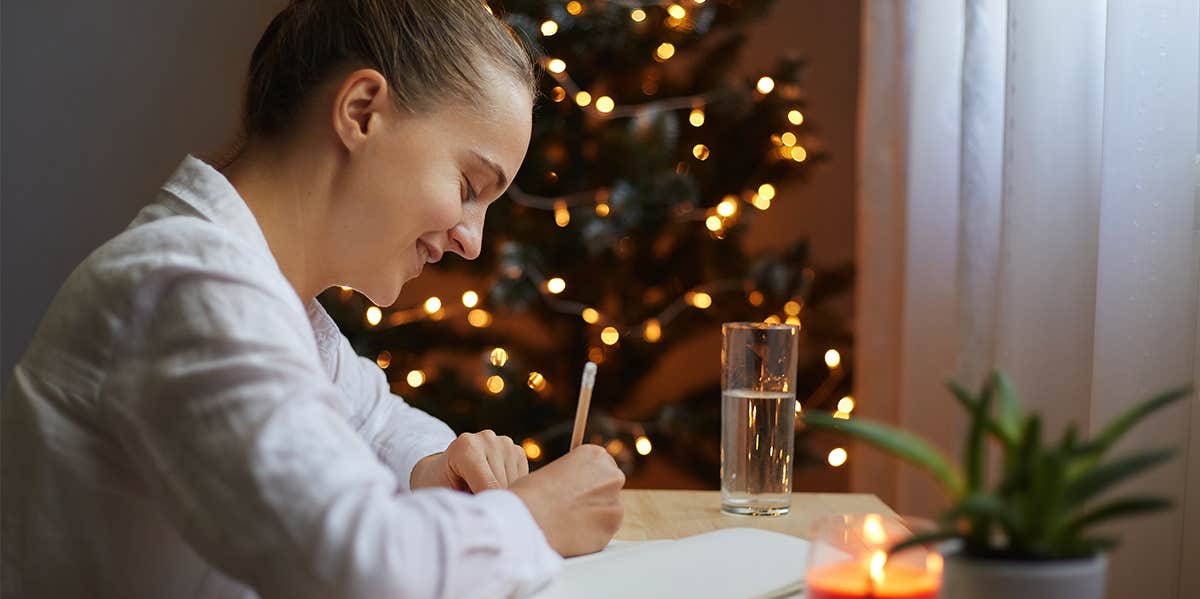 woman making her resolution list