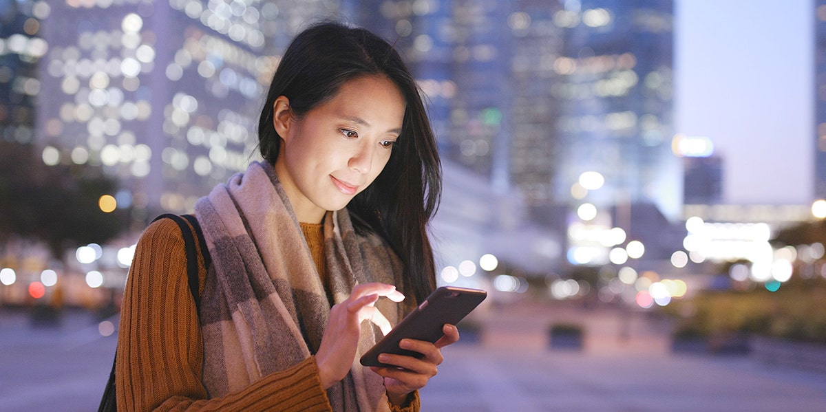 woman looking at phone 