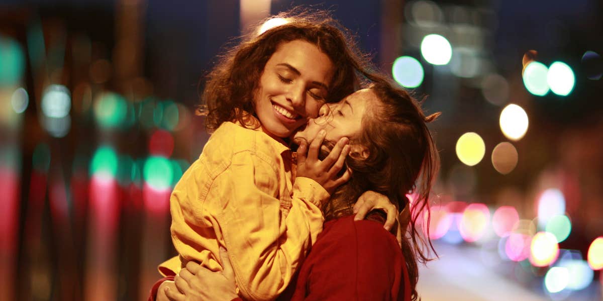 couple kissing in the street